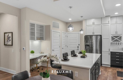 Fourth Ward Apartment | Reluxme| Lux 2BR Uptown| Spa Access + Skyline View