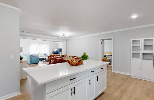 Shell Point House | Remodeled cozy ocean themed home with outdoor seating & firepit