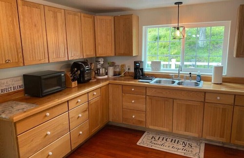 Ninilchik House | Remodeled home with fire-pit, within walking distance of Deep Creek River.