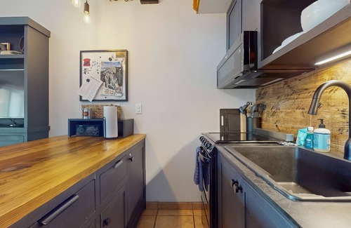 Red River Condo | Remodeled Main Street condo with balcony & fireplace - walk to lifts and dining