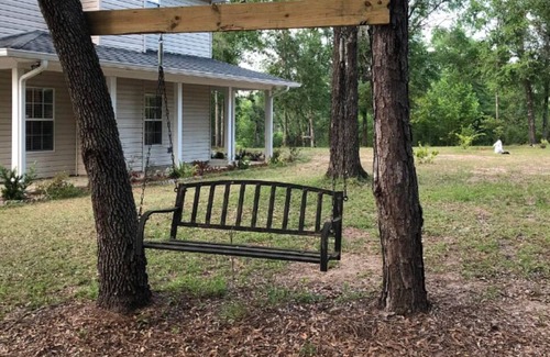 Chipley House | Remote property with a pond view