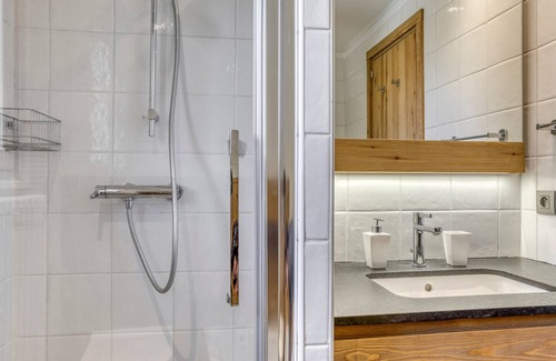 Le Planellet Apartment | Renovated 2-Bedroom Apartment in Megève Centre with Balcony, Fireplace, and Covered Parking