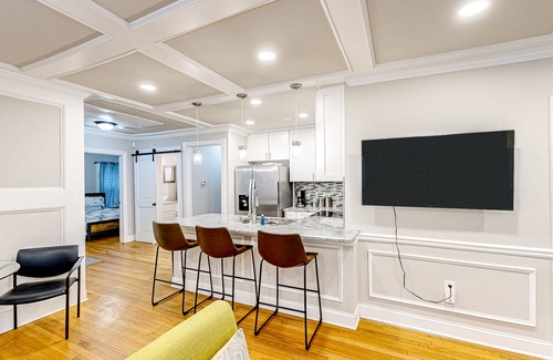 East Point House | Renovated downtown house w/enclosed backyard, deck, fireplace, central AC & W/D