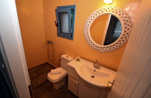 Platis Gialos House | Renovated haystack with Cycladic details.