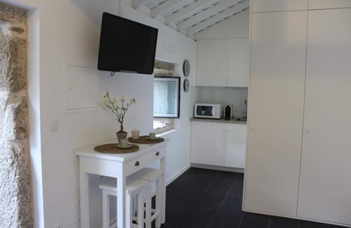 Ponte de Lima House | Renovated Mill by Waterfalls 1