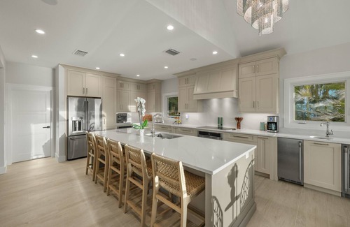 Captiva House | RENT NOW! NEW, WATERFRONT HOME, IN VILLAGE, POOL, HOT TUB, DOCK, PUTTING GREEN!