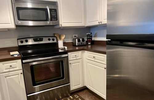 Wesley Chapel Condo | Resort Corner Unit Gem – Spacious 2BR Ground-Floor Condo w/Patio, Pond Views & Smart TVs!