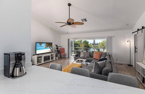 Mid Island House | Resort Oasis 4-bed/4.5 bath + Pool + Boat & Jet Ski Lifts, Game Room + Gym!