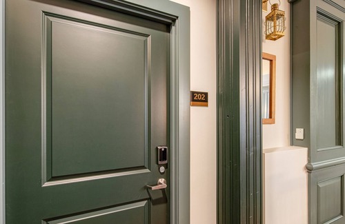 Poulsbo House | Restored 9-room boutique hotel in historic downtown with city views & parking