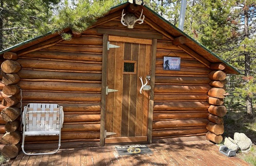 Marion Cabin | Retreat to our cozy cabin nestled in a private hideaway.nSolar lights & shower