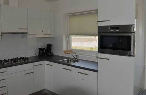 Zuideinde Apartment | Rietwohnung 01 - Riet apartment by Meer-Ferienwohnungen