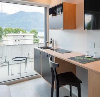 Minusio Hotel | Riva Rooms & Studios - Check-In 24hr