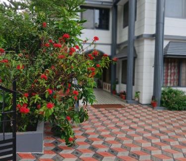 Madikeri House | River view white villa