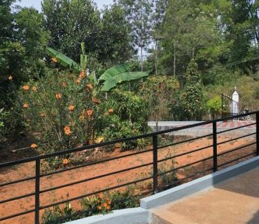 Madikeri House | River view white villa