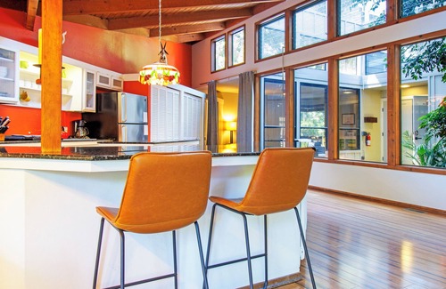 Northwood House | Riverfront 3 Bed 2 1/2 Bath, Woodstove, HOT TUB, Private Beach, Kayaks+ Pets OK