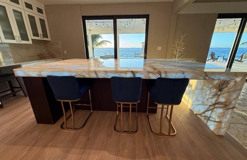 Riverside Park Villa | Riverfront 5 bedrooms, 5 baths , pool , spa , beach , dock and stunning views !
