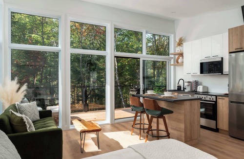 Sainte-Beatrix Ski Chalet | Riverfront Tranquil Haven with Private Trails