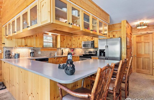 Drake Cabin | Riverfront Updated Cabin Close to Estes Park New Hot Tub 3 Private Acres Pet OK