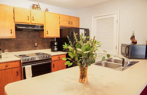 Helen House | Rivers Edge Condo 104