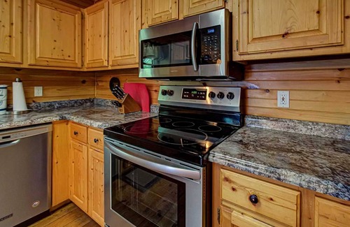 Cosby Cabin | Riverside Fall Retreat | Arcade, Hot Tub, Fire Pit