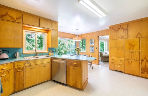 Dexter House | Riverside retreat with hot tub on the Huron River! 10 miles to UofM!