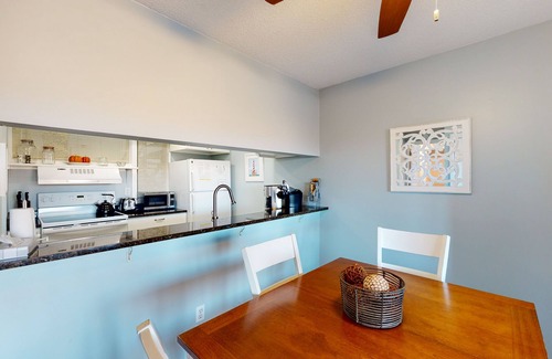 Maple City Condo | Riverview condo near the lake with beach access, fireplace, patio & cable
