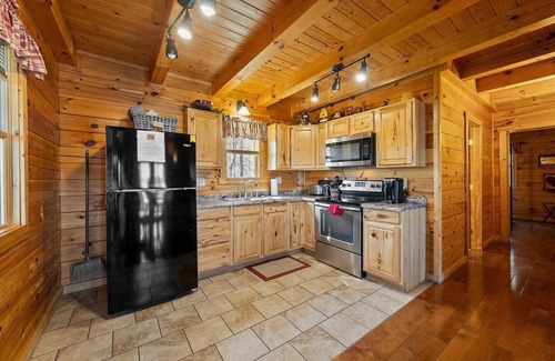 Logan Cabin | Romantic Log Cabin Hot Tub Fireplace View