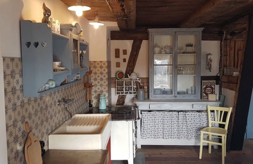 Ludwigshafen Apartment | Romantic vacation apartment in renovated half-timbered house from 1706 with courtyard and garden