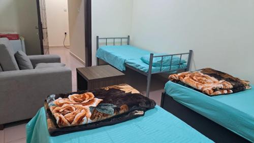 Al Ghubrah Ash Shamaliyyah Apartment | Room center