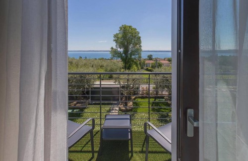 Moniga del Garda Bed & Breakfast | Room in B&B - Insula Felix - Deluxe Double Room With Balcony and Sea View