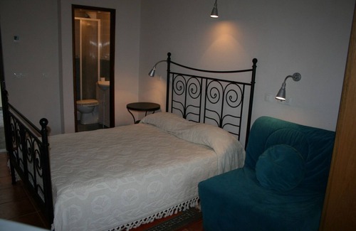 Porto Covo House | Room 'Quarto 8' in Porto Covo with a Fan