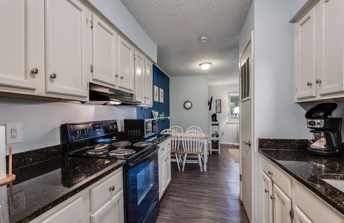 Port Aransas Condo | Roomy 1 BDRM Large Pool w/a Private Courtyard and a 5 Min Walk to the Beach