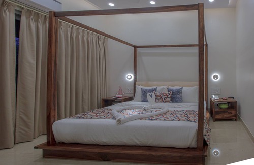 Alto de Porvorim Hotel | ROSASTAYS North Goa Rosa Kuber Mandovi