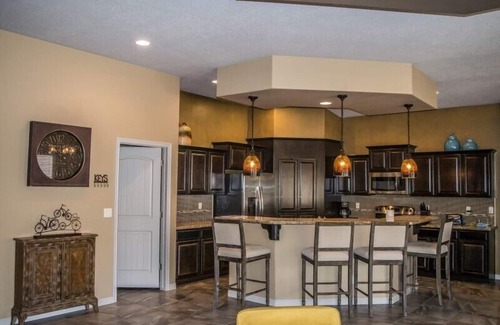 Mesquite House | Roulette Retreat by Mesquite Vacation Rentals with Two Primary Suites, Putting Green and $510 in free daily activities