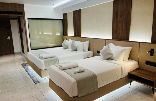 Kozhikode Hotel | Royal Plaza Inn by RAK Rooms