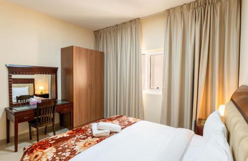 Al Majaz Apartment | Royal Tulip - One Bedroom Apartment