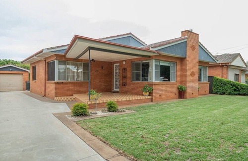 Dubbo House | Roycox Cottage - Charming Escape, Fireplace