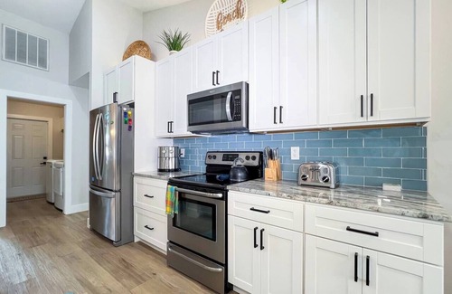 Trafalgar House | Ruby's Retreat, heated pool, private oasis, fenced backyard