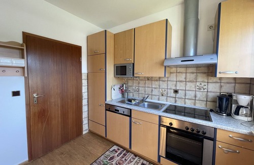 Borkum Apartment | Ruhepol am Meer: Gemütliche Ferienwohnung in Grüner Umgebung
