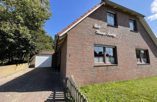 Borkum Apartment | Ruhepol am Meer: Gemütliche Ferienwohnung in Grüner Umgebung