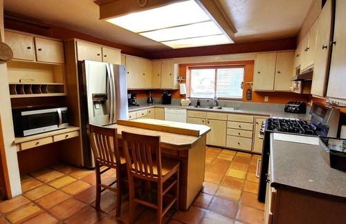 Red River House | Running Bear River Lodge - Pet Friendly - 9 Bedroom Home - In Town - On The Rive