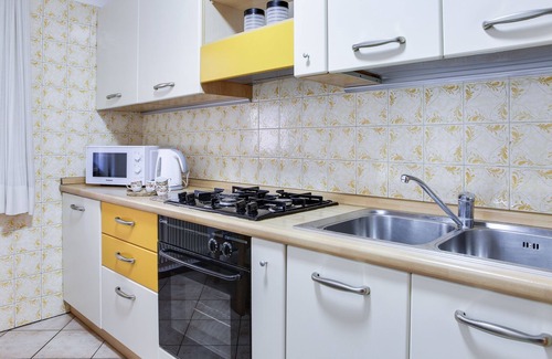 Moena Apartment | Rustic Apartment Casa March 1 with Wi-Fi, Balcony, Garden & Mountain View