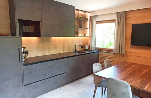 Santa Cristina Val Gardena Apartment | Rustic Apartment "Emil" with Balcony, Mountain View, Garden & Wi-Fi