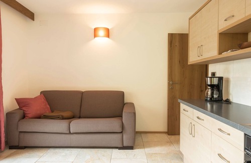 Santa Cristina Val Gardena Apartment | Rustic Apartment "Emil" with Balcony, Mountain View, Garden & Wi-Fi