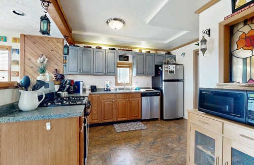 Paradise Point House | Rustic hideaway with hot tub, pool table, wood fireplace, firepit - dog-friendly