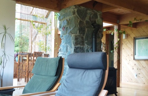 Acme House | Rustic mountain view home on wooded, private 25 acres