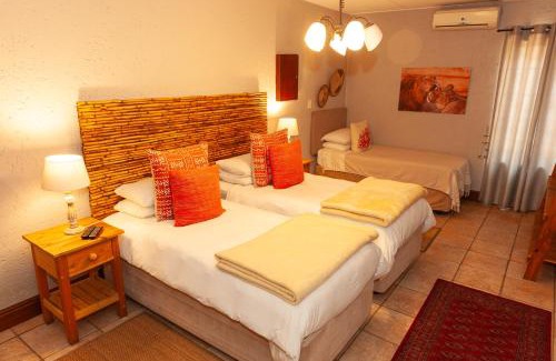 Kempton Park Hotel | Safari Club Guest Lodge OR Tambo International Airport