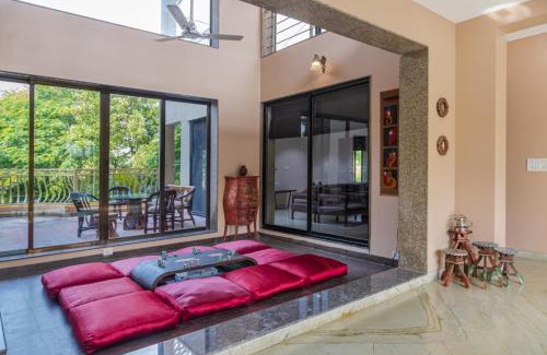 Alibaug Villa | SaffronStays Aura, Alibaug - luxury pool villa with a game room and spacious lawn