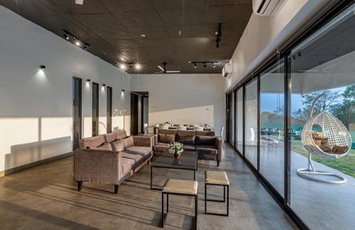Khalapur Villa | SaffronStays Stargazer, Karjat - luxury pool villa with lake view