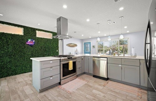 Palm Valley House | Sailfish Beach House - Pool! Hottub! Koi Pond! Game Room!